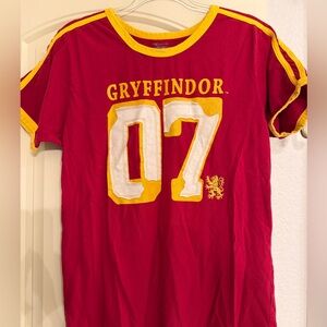 Warner Bros. Gryffindor Red and Yellow women’s short sleeve T-shirt. Size Medium